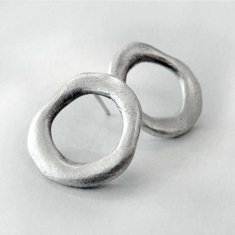 Medium - sized silver front facing hoops