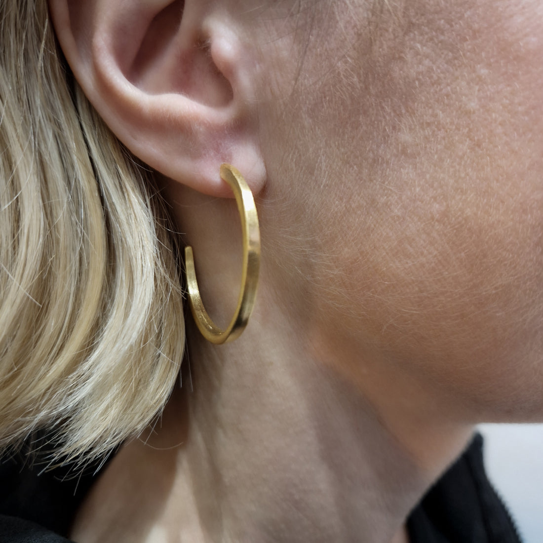 Large minimal hoop earrings in silver gold plated.