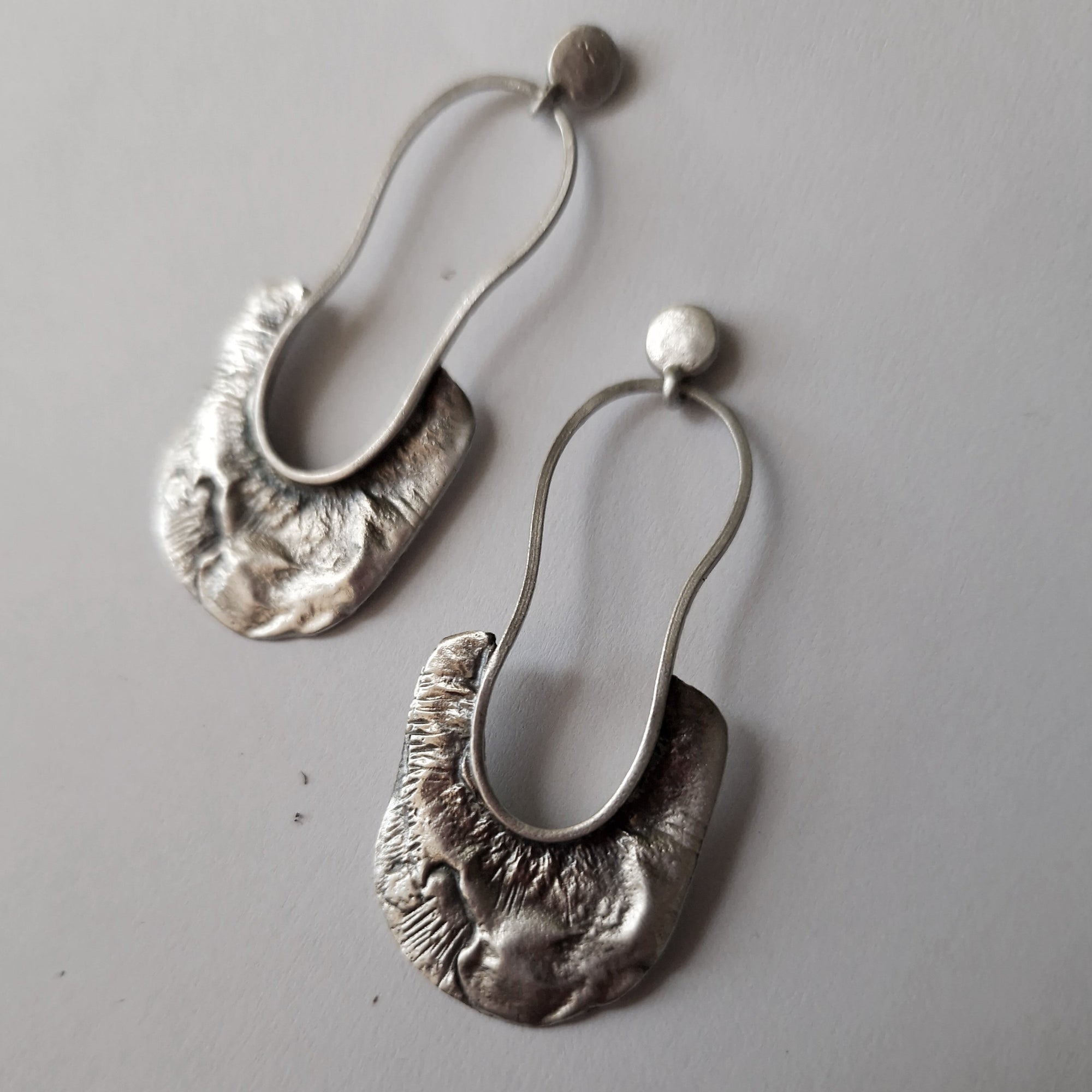 Silver long stud earrings «Volcano»