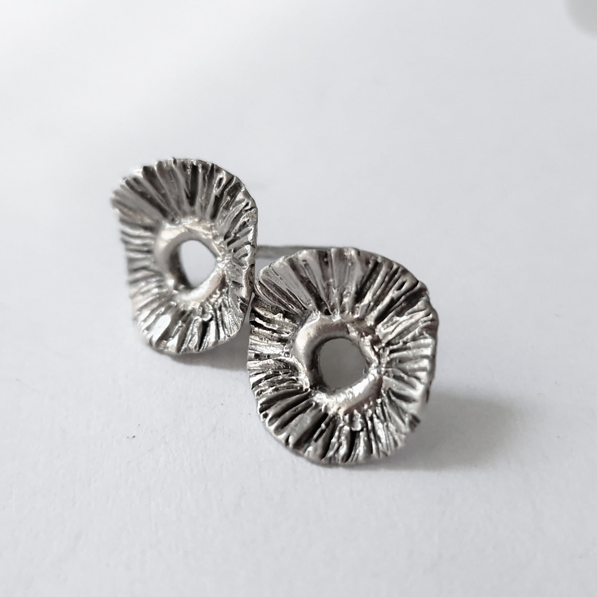 Silver «flower» stud earrings.