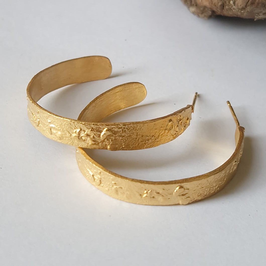 Large silver, gold plated hoop earrings