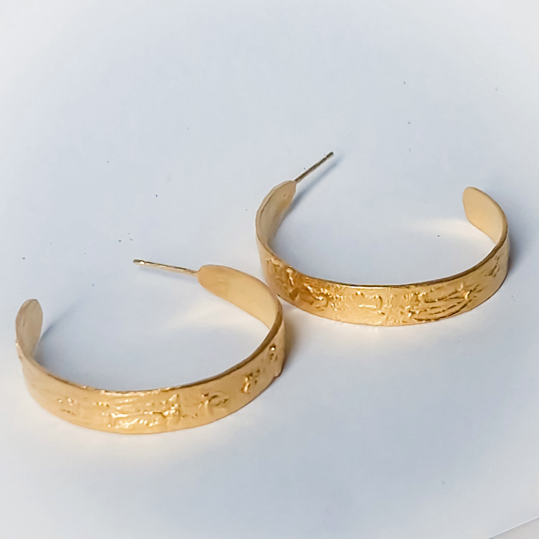 Large silver, gold plated hoop earrings