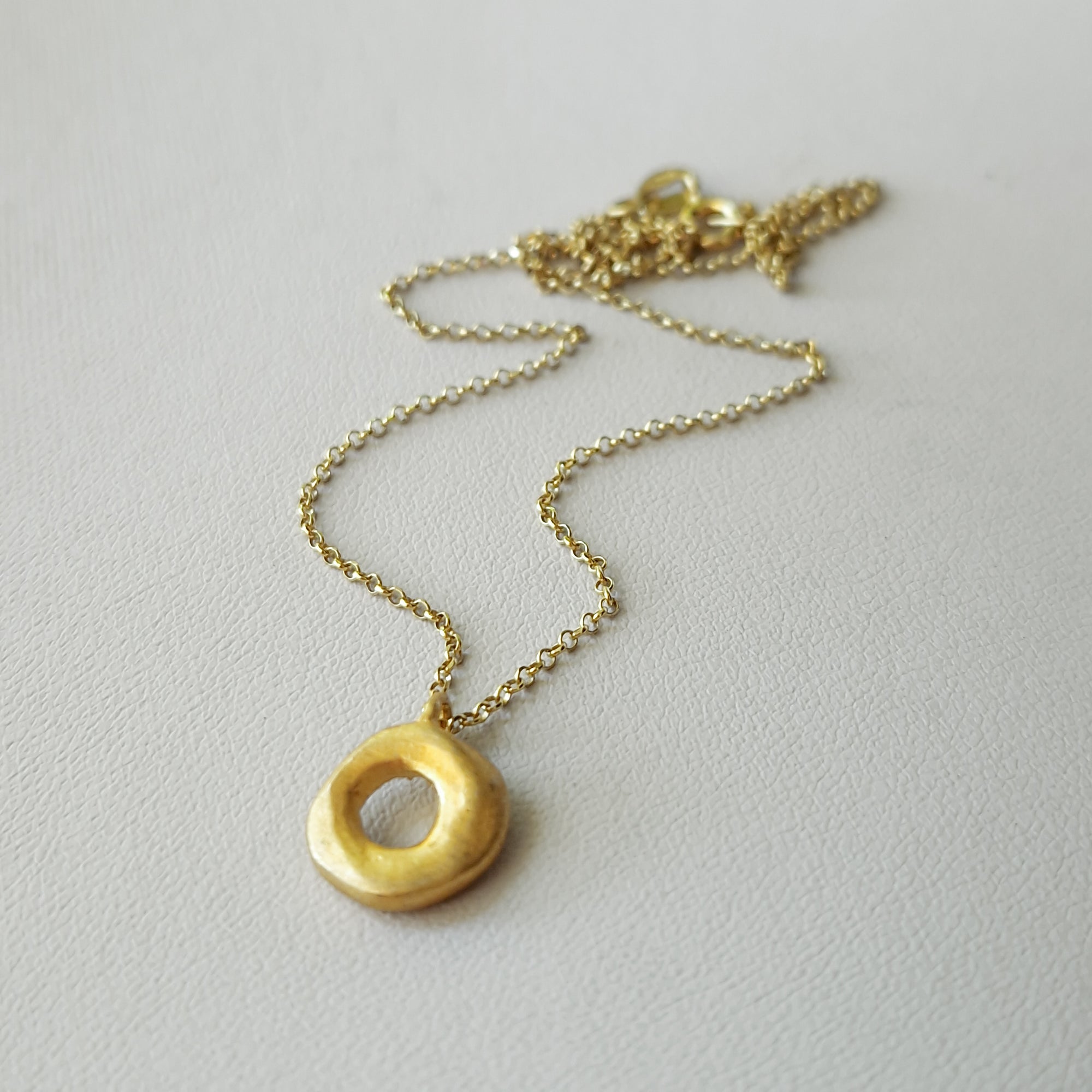 Small gold circle necklace