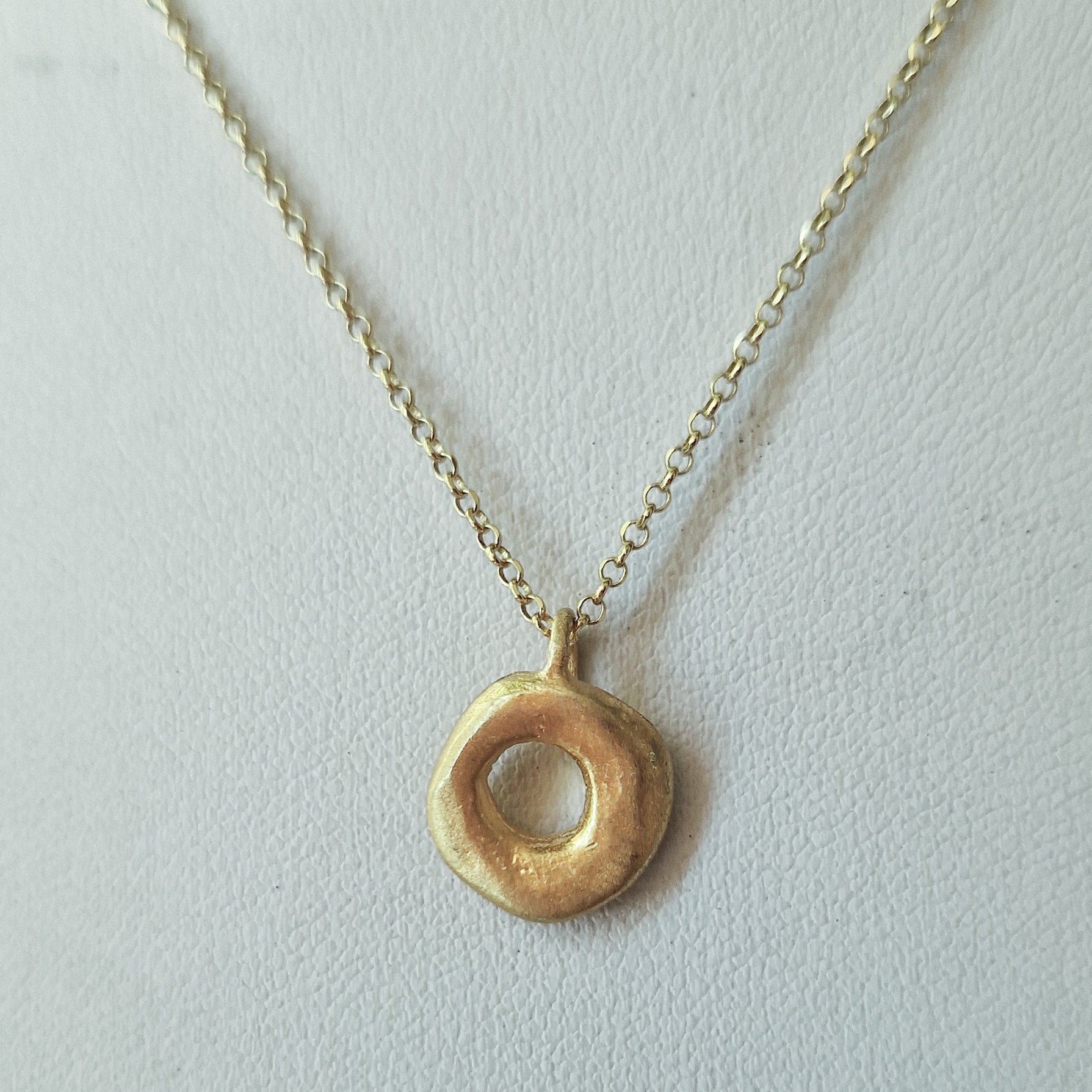 Small gold circle necklace