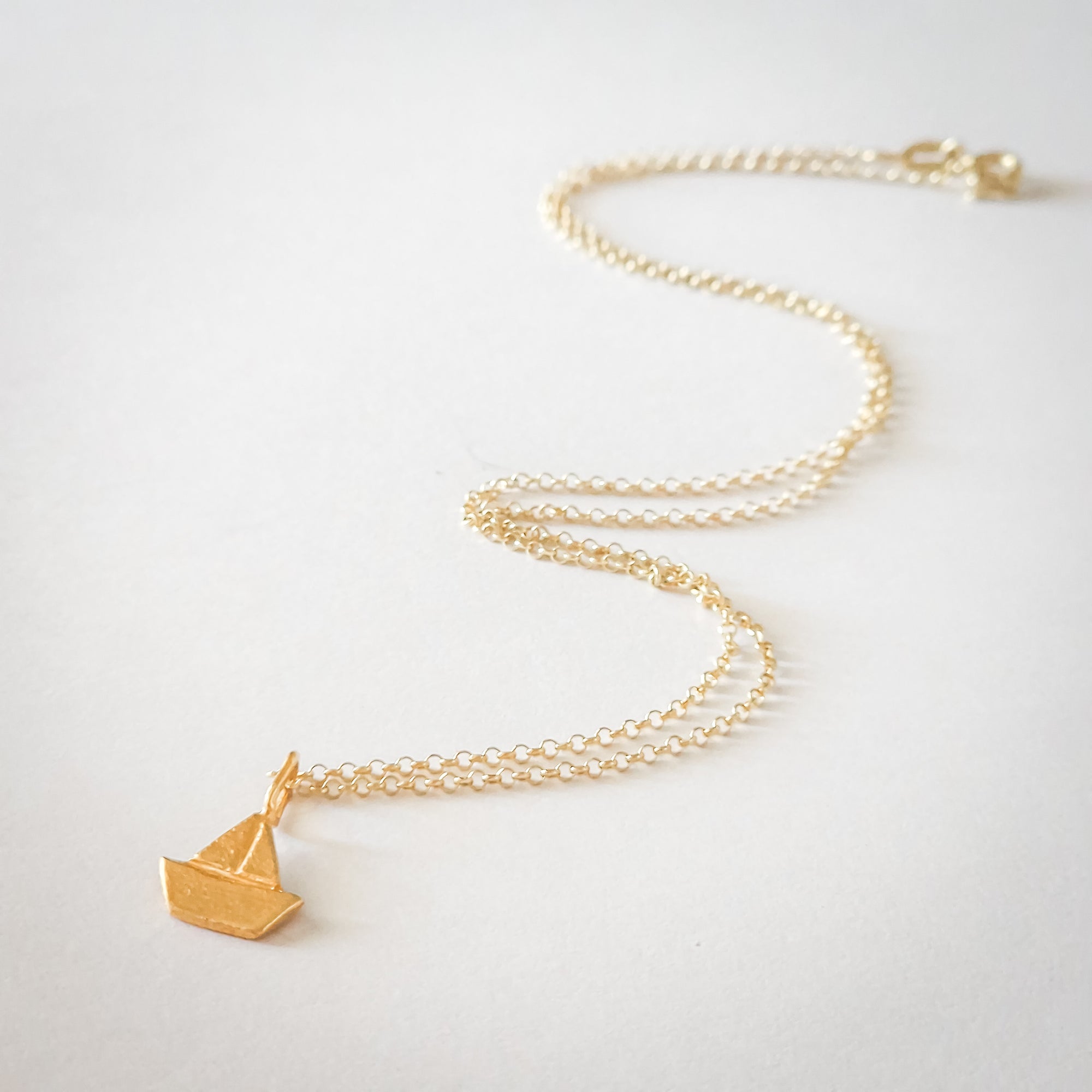 Gold boat necklace