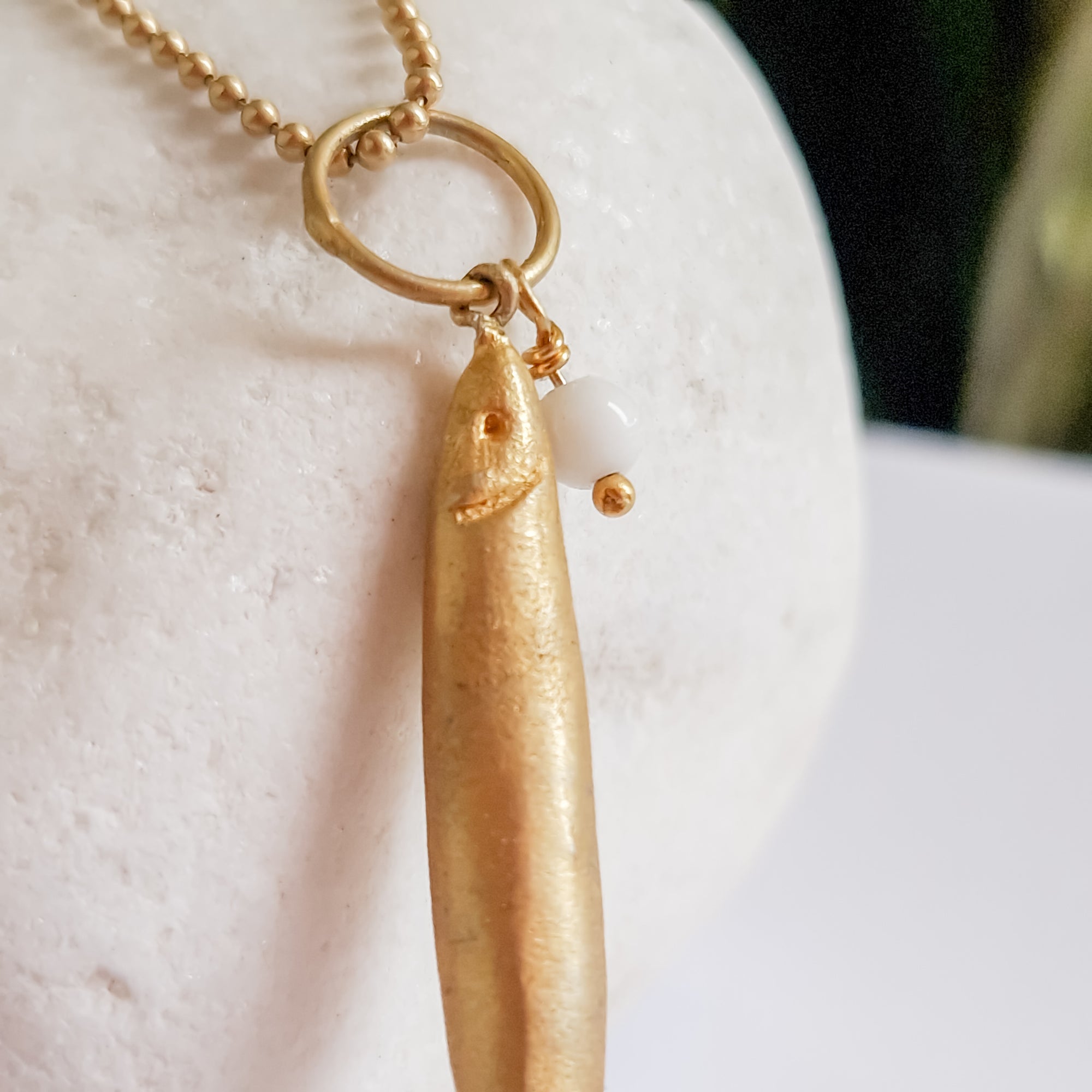 Long gold fish pendant