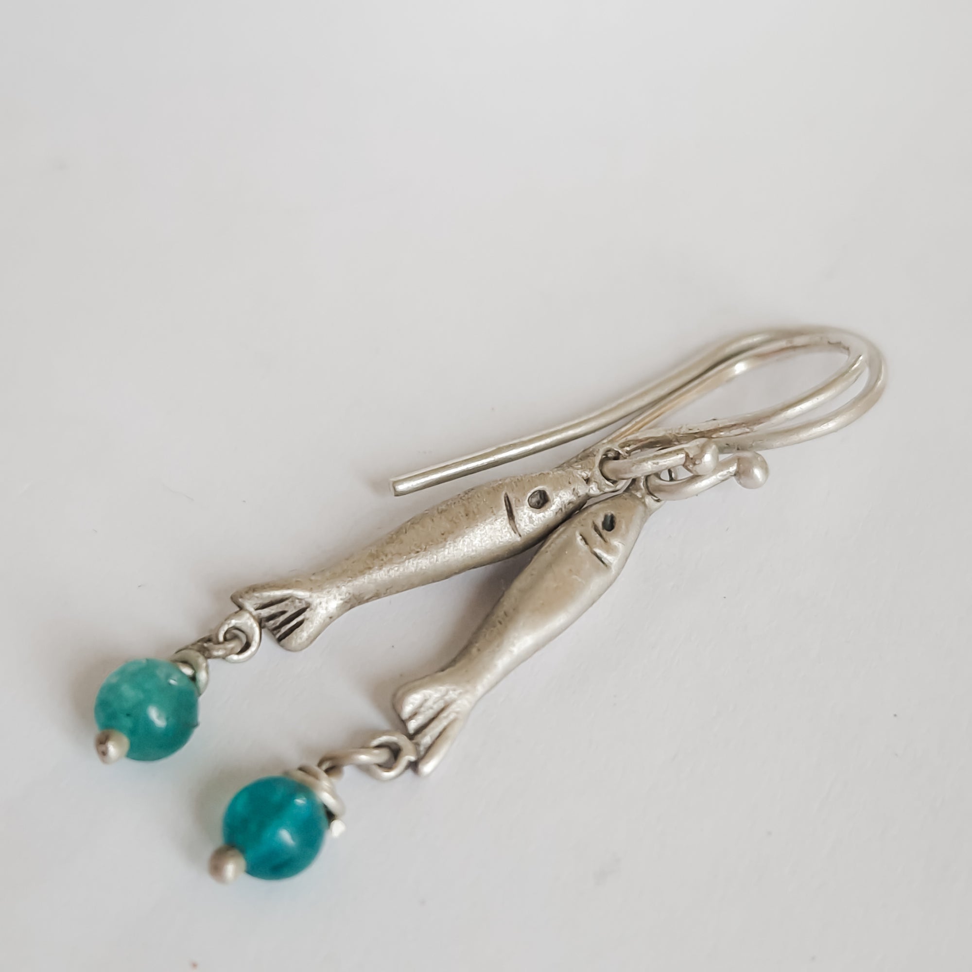 Silver «fish» earrings with dangle bead