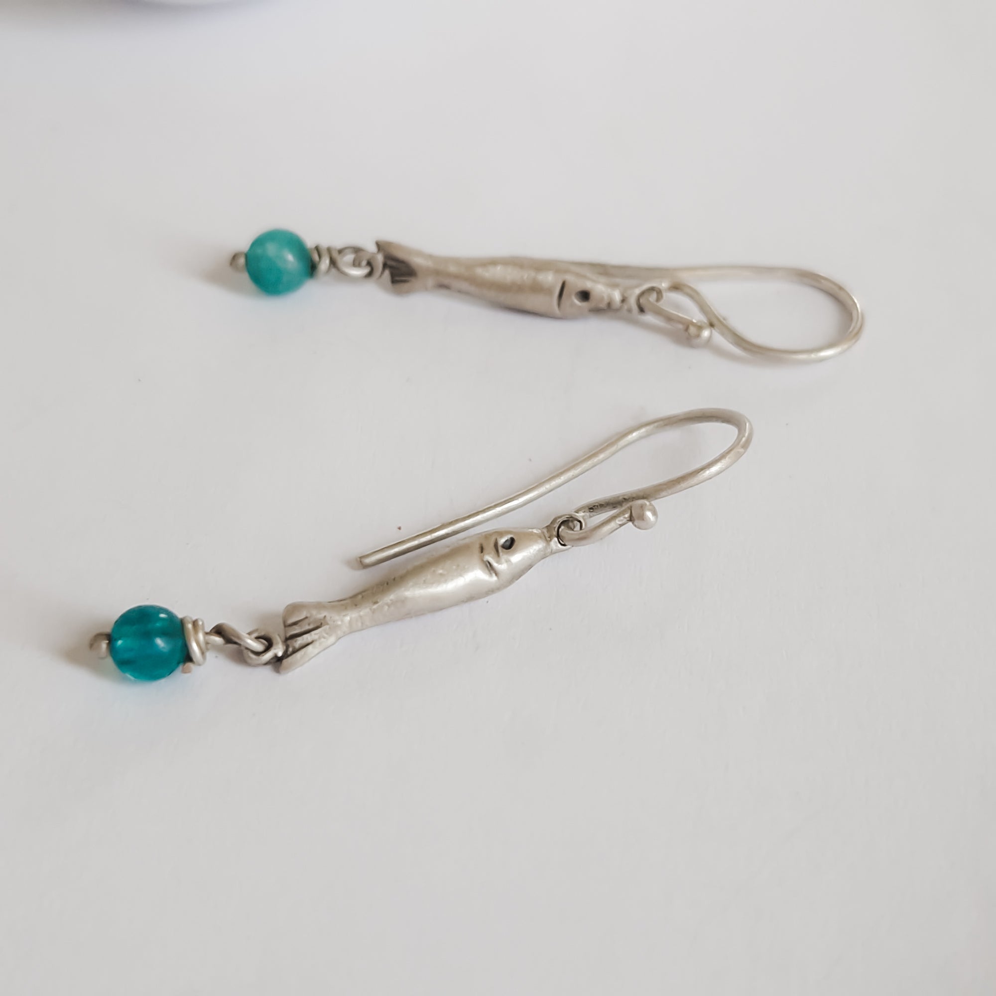 Silver «fish» earrings with dangle bead