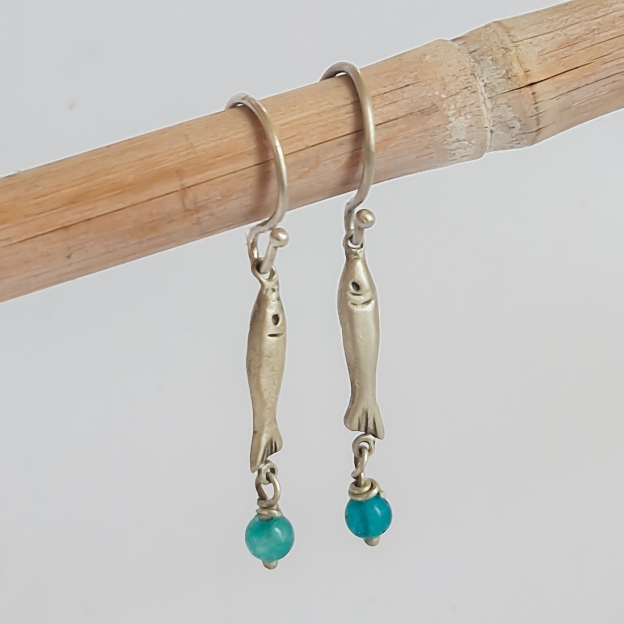 Silver «fish» earrings with dangle bead