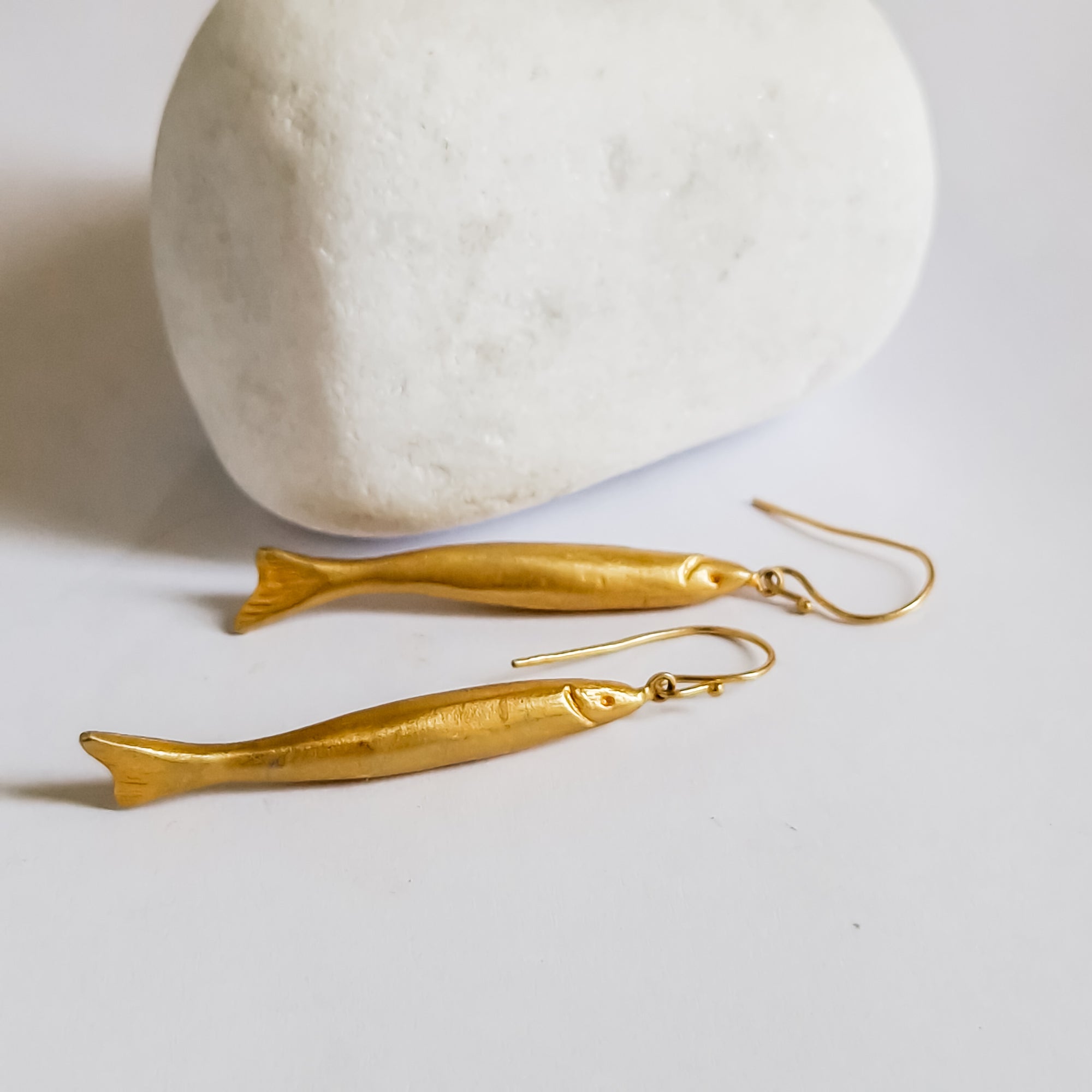 Long gold dangle earrings «fish»