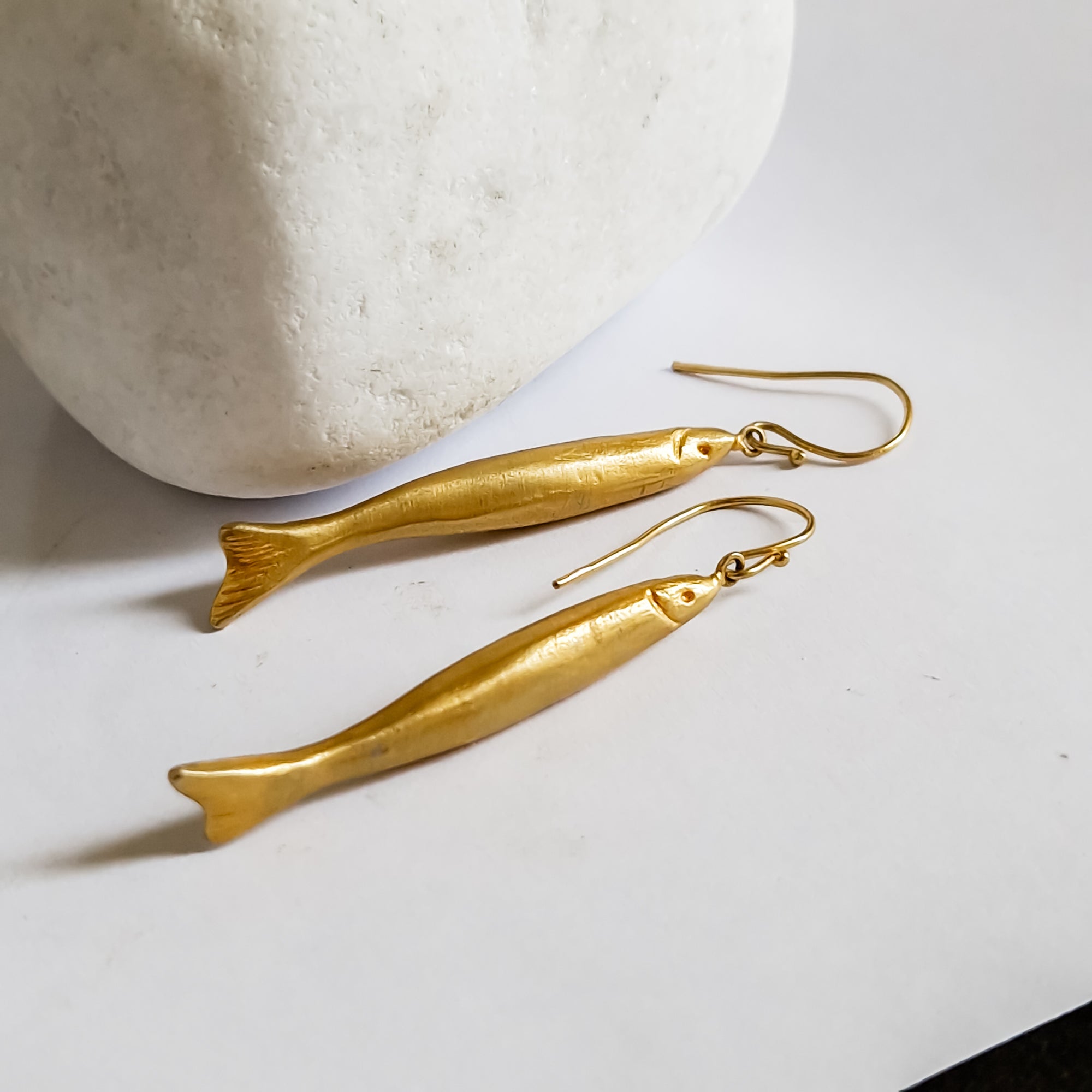 Long gold dangle earrings «fish»