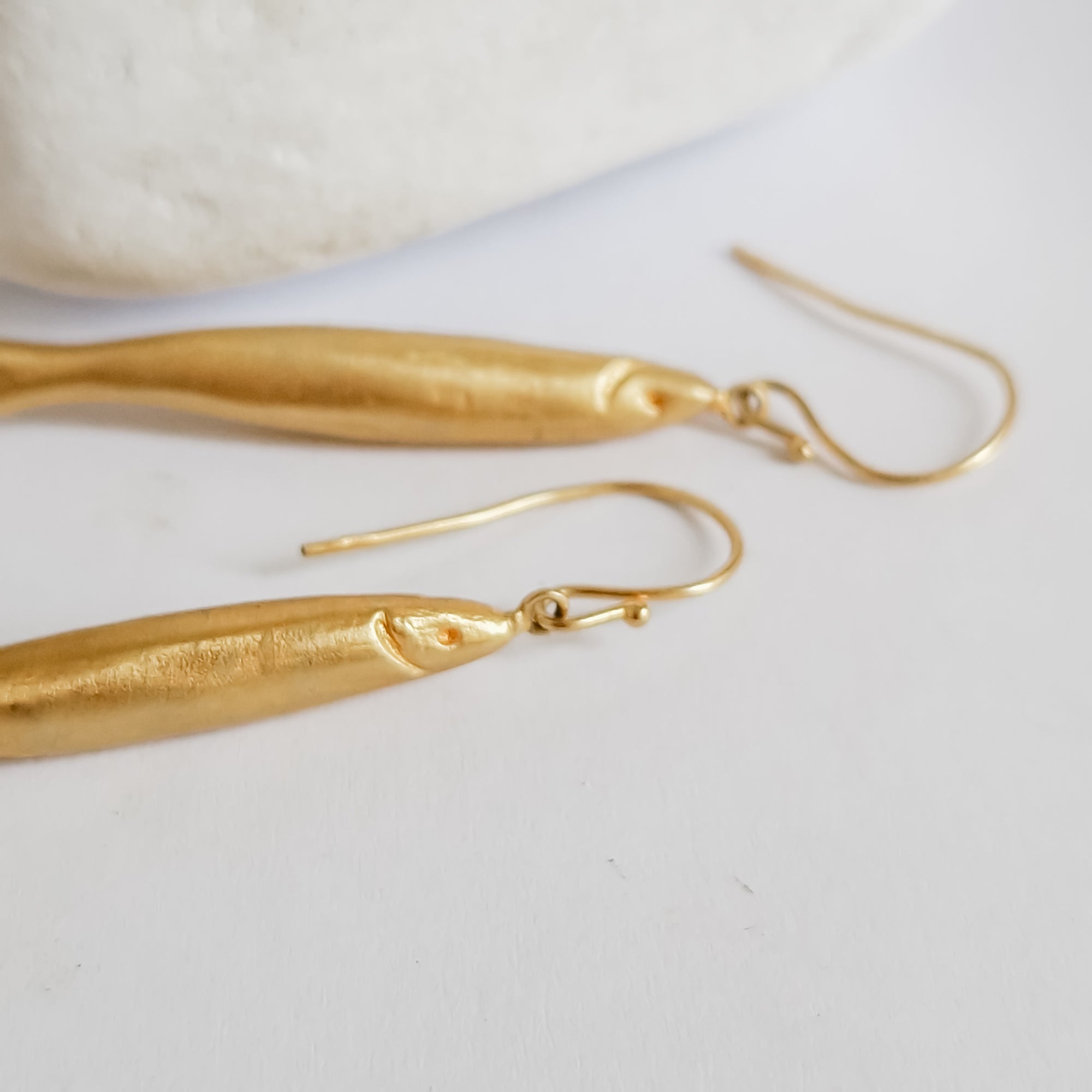 Long gold dangle earrings «fish»