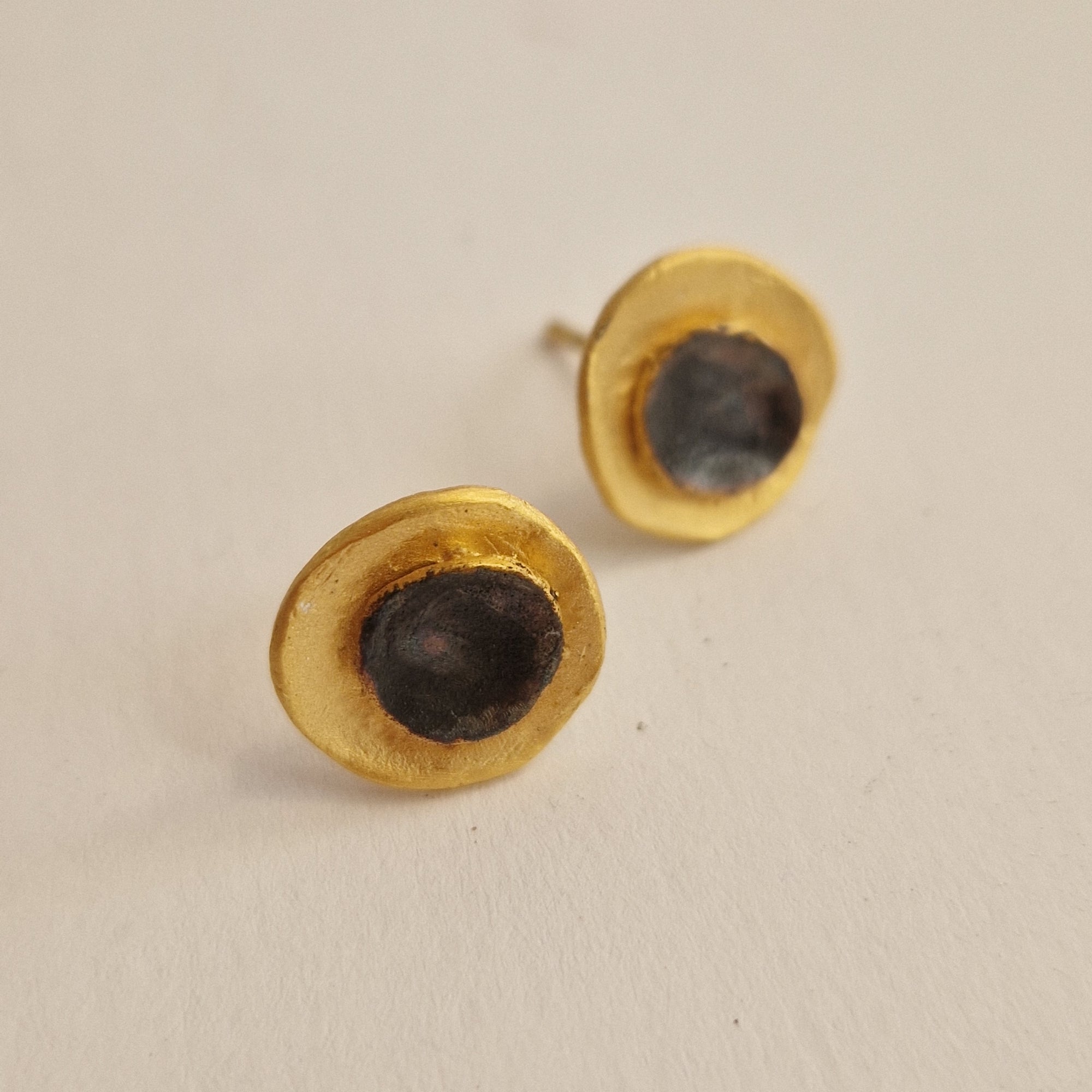 Small gold-plated silver earrings «Eclipse»  with matte finish and dark patina