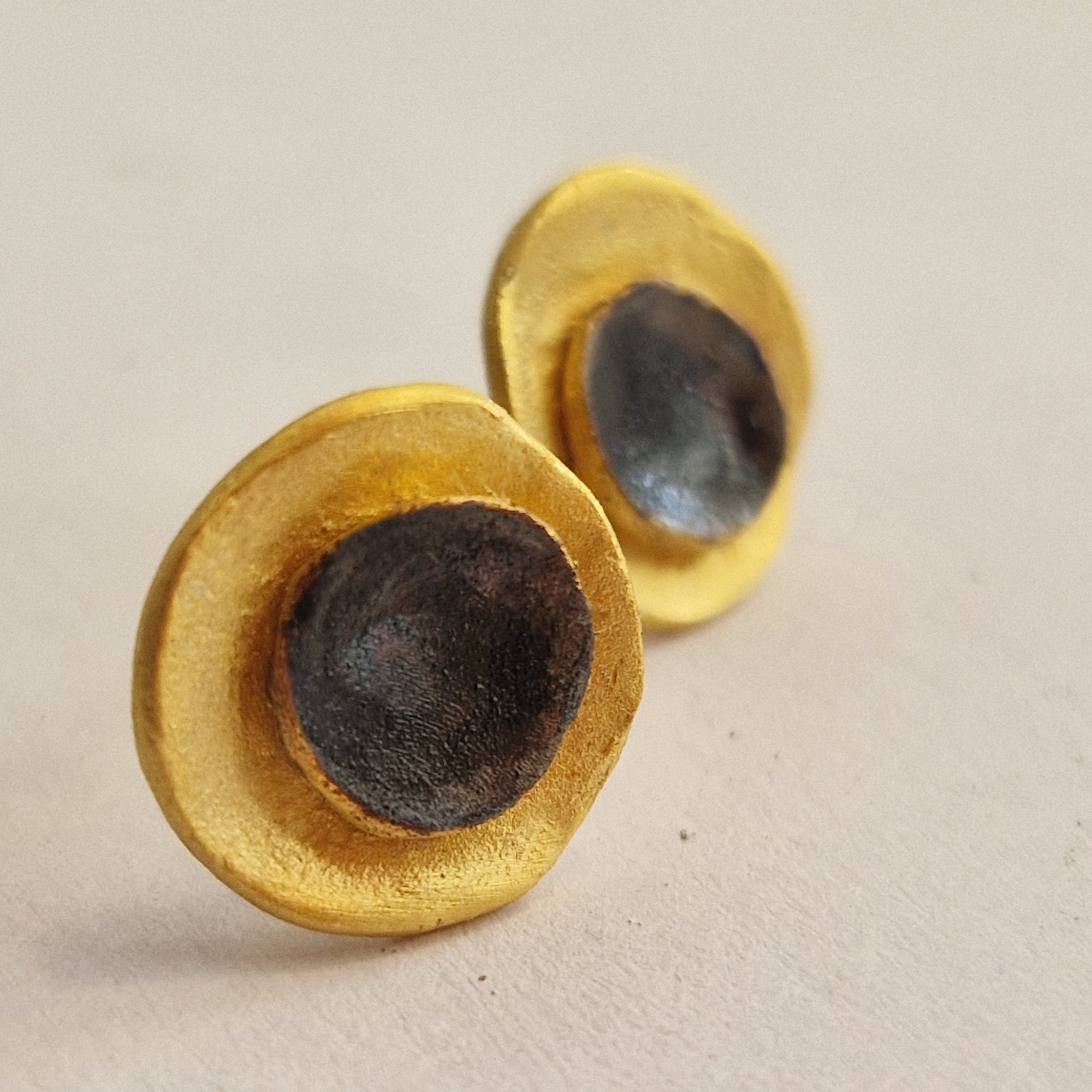 Small gold-plated silver earrings «Eclipse»  with matte finish and dark patina