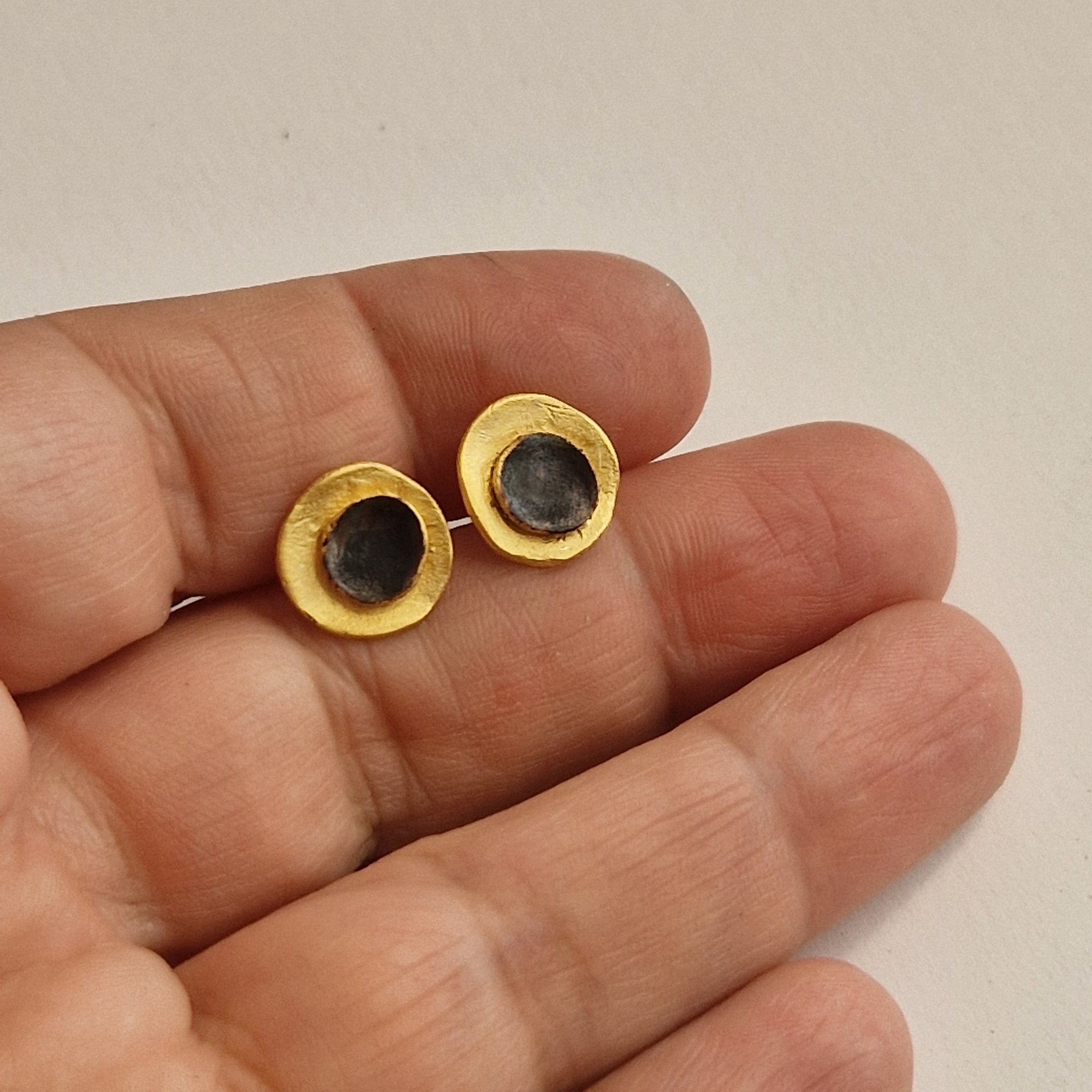 Small gold-plated silver earrings «Eclipse»  with matte finish and dark patina