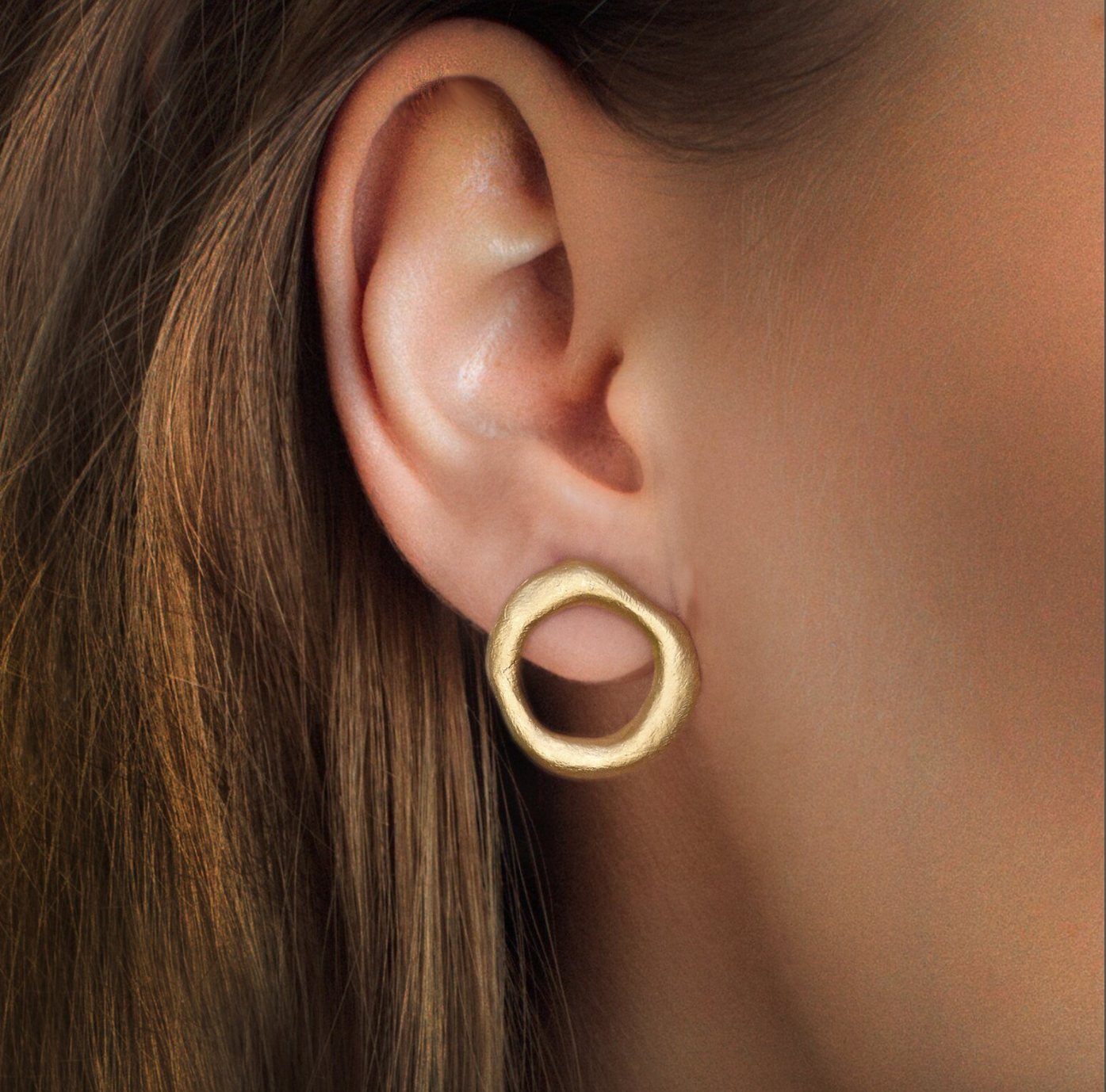 Medium - sized Gold plated front facing hoops.