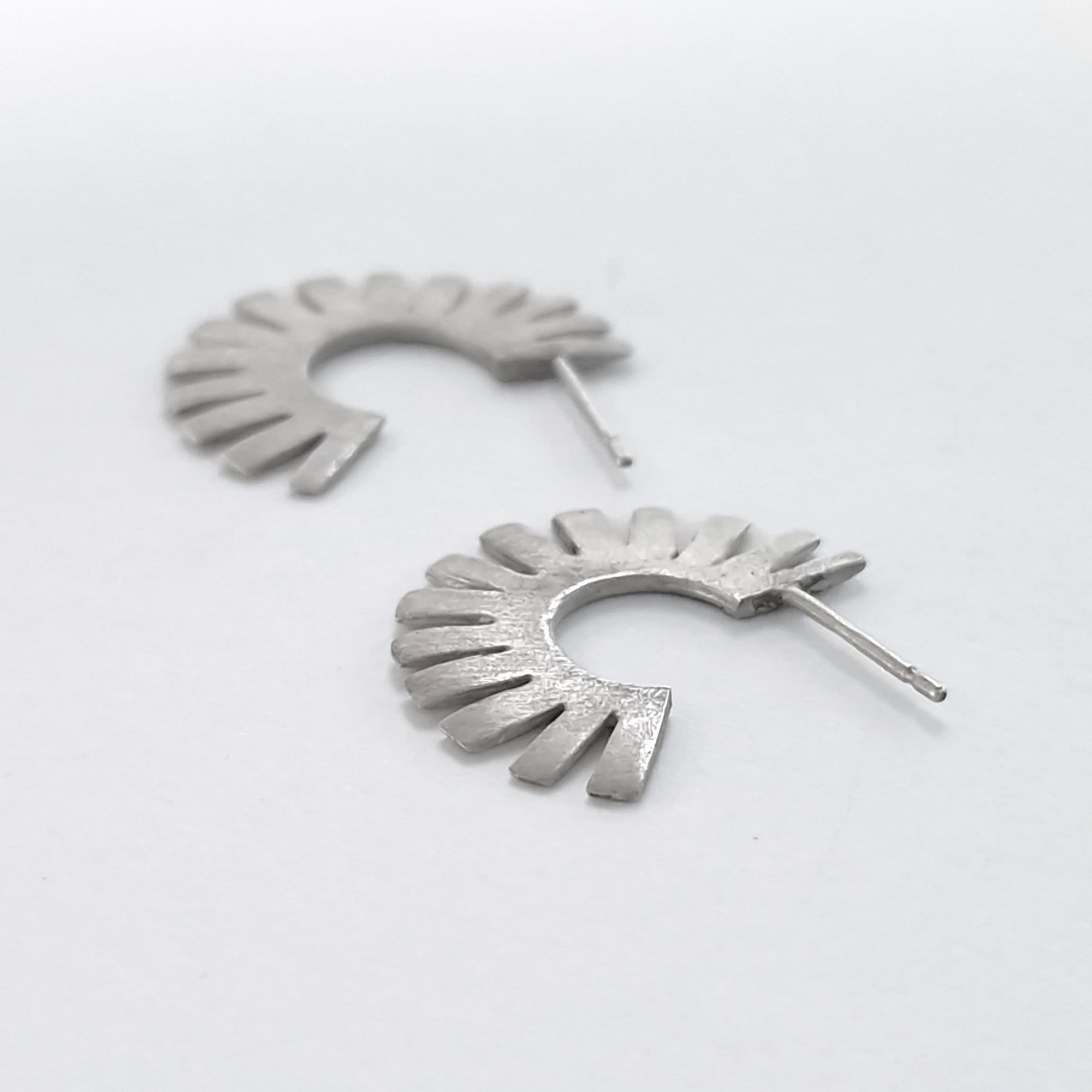 Silver hoop earrings «Sun»