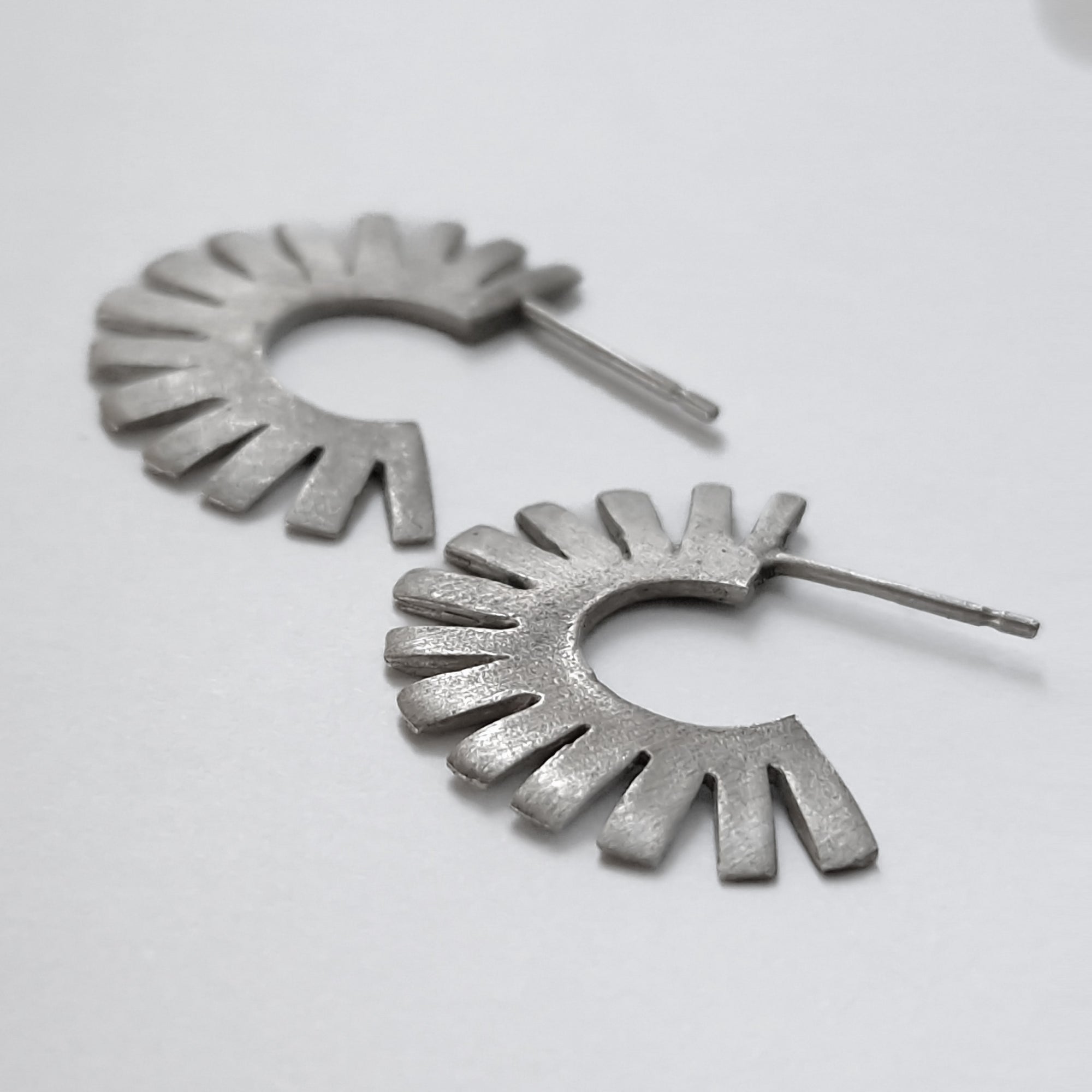 Silver hoop earrings «Sun»