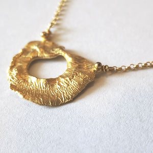 Organic sculptural texture of VOLCANO gold plated silver necklace