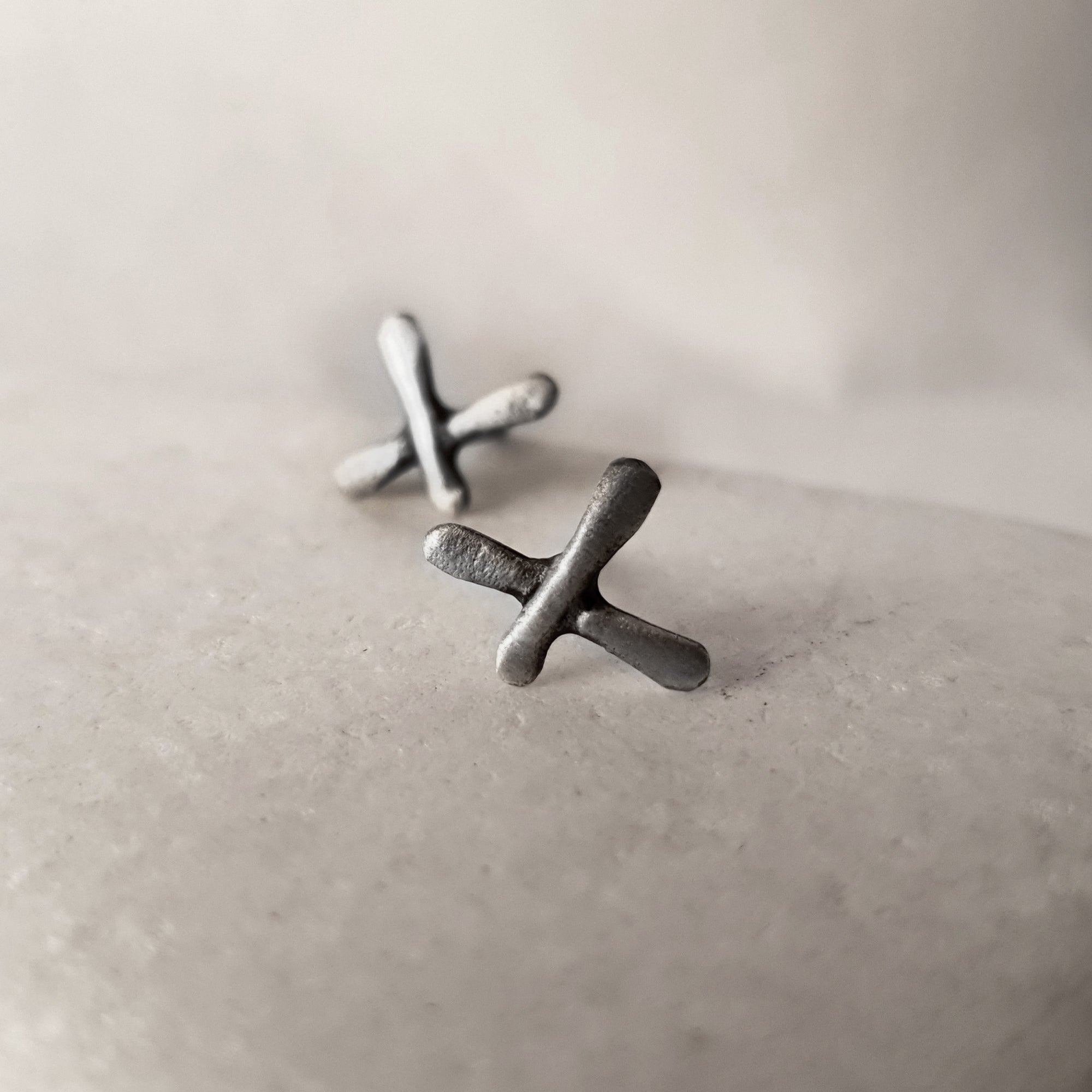 Unisex X stud earrings