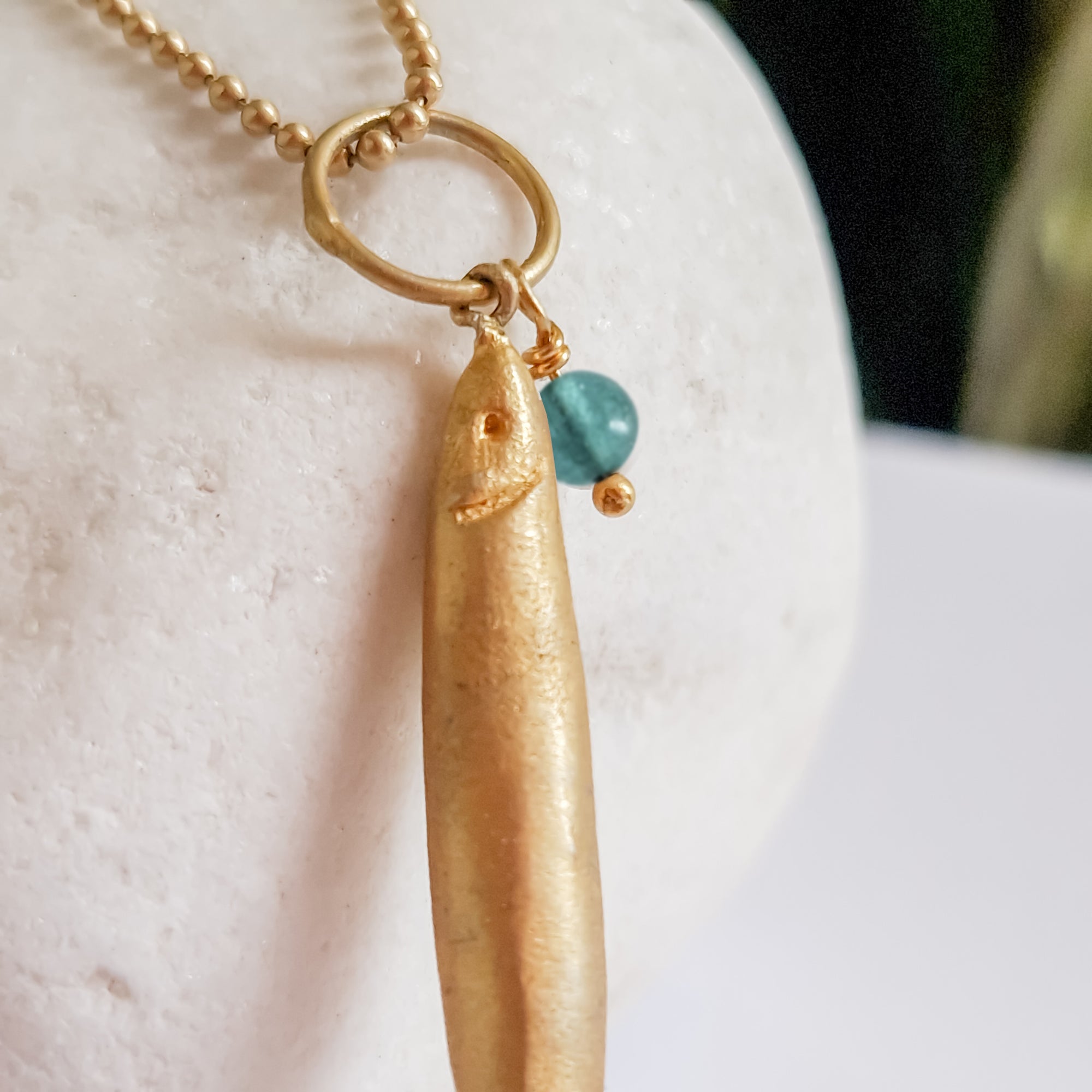 Long gold fish pendant