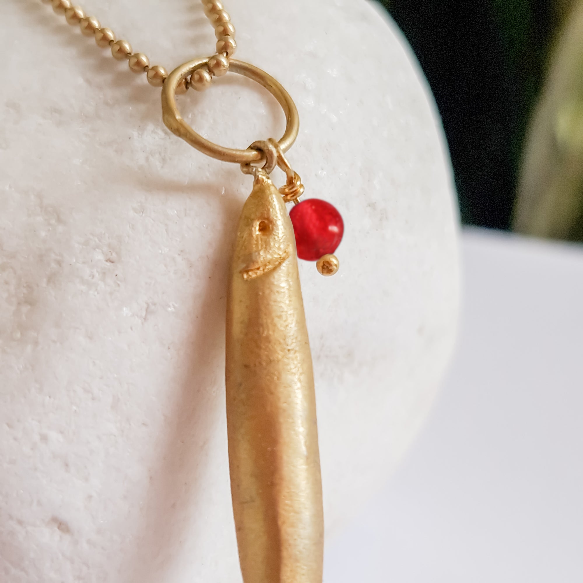 Long gold fish pendant