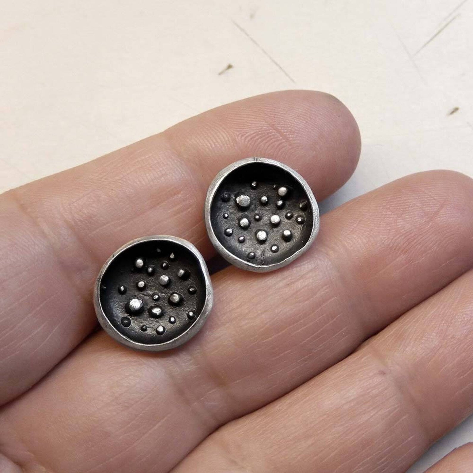 Full Moon silver stud earrings with matte finish, granulation and dark patina