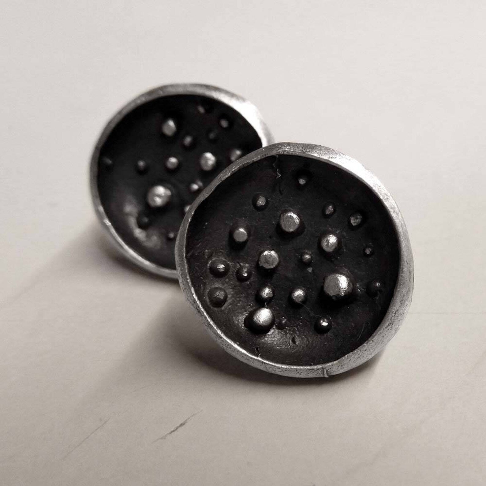 Full Moon silver stud earrings with matte finish, granulation and dark patina