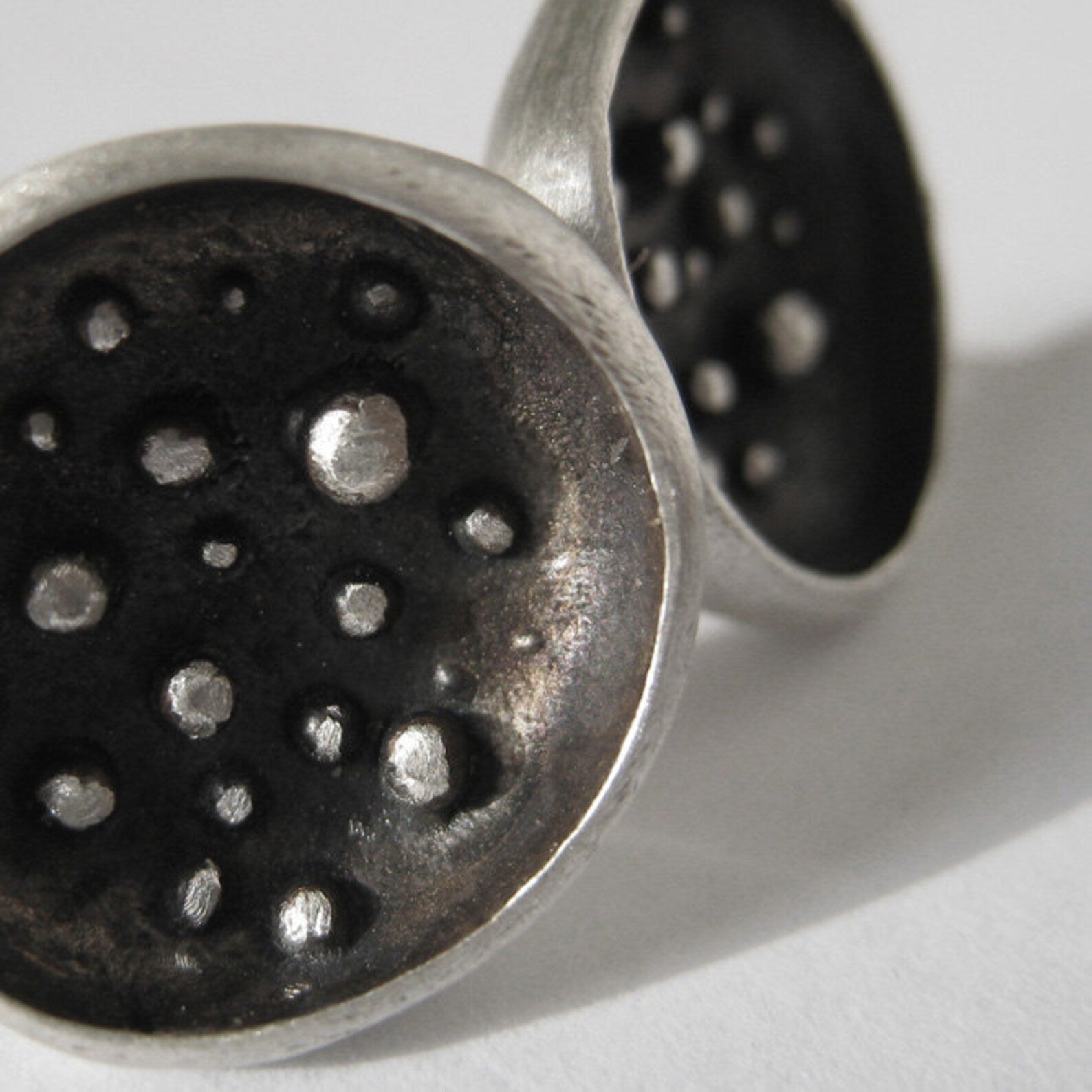 Full Moon silver stud earrings with matte finish, granulation and dark patina