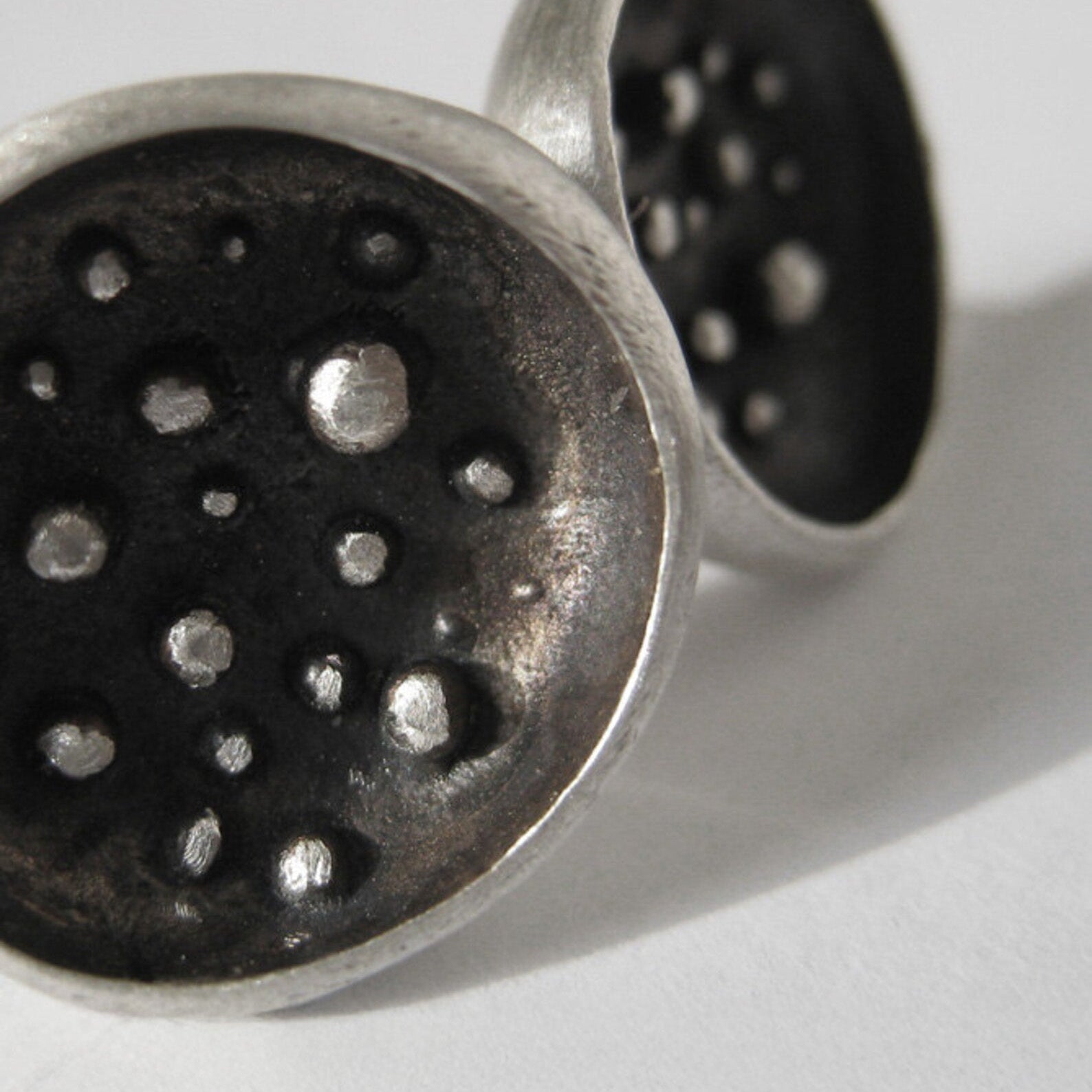 Full Moon silver stud earrings with matte finish, granulation and dark patina