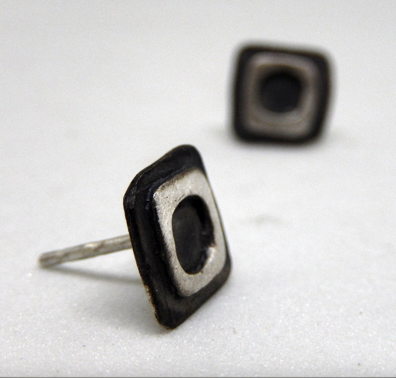 Square stud earrings for men and woman.