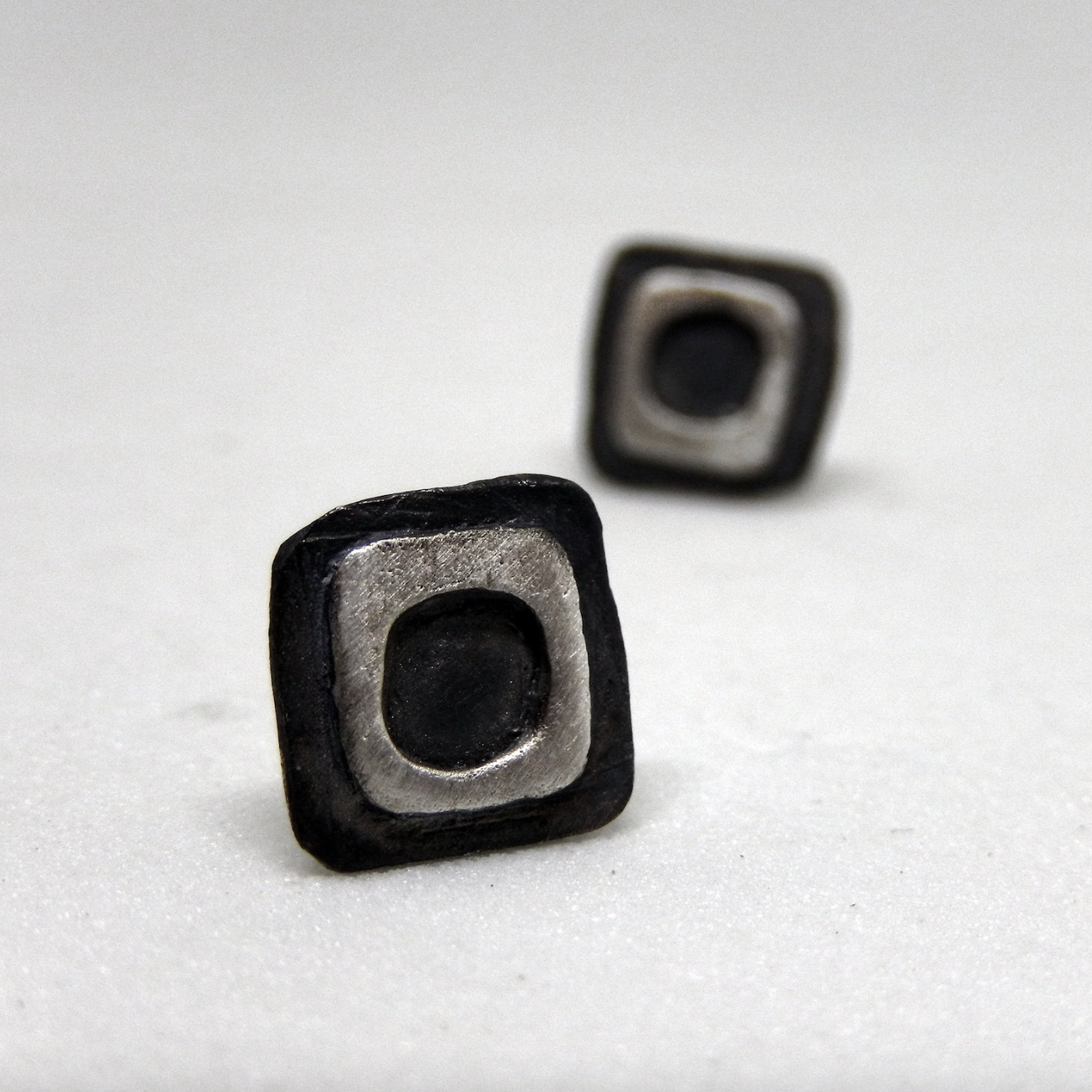 Square stud earrings for men and woman.