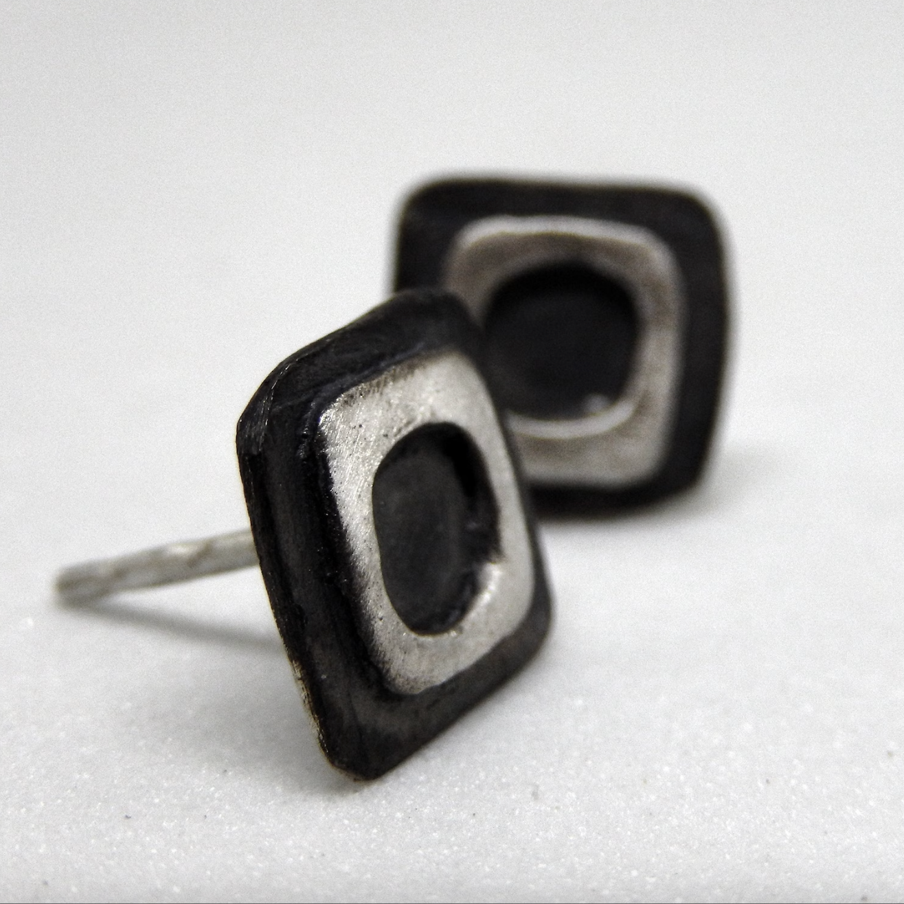 Square stud earrings for men and woman.